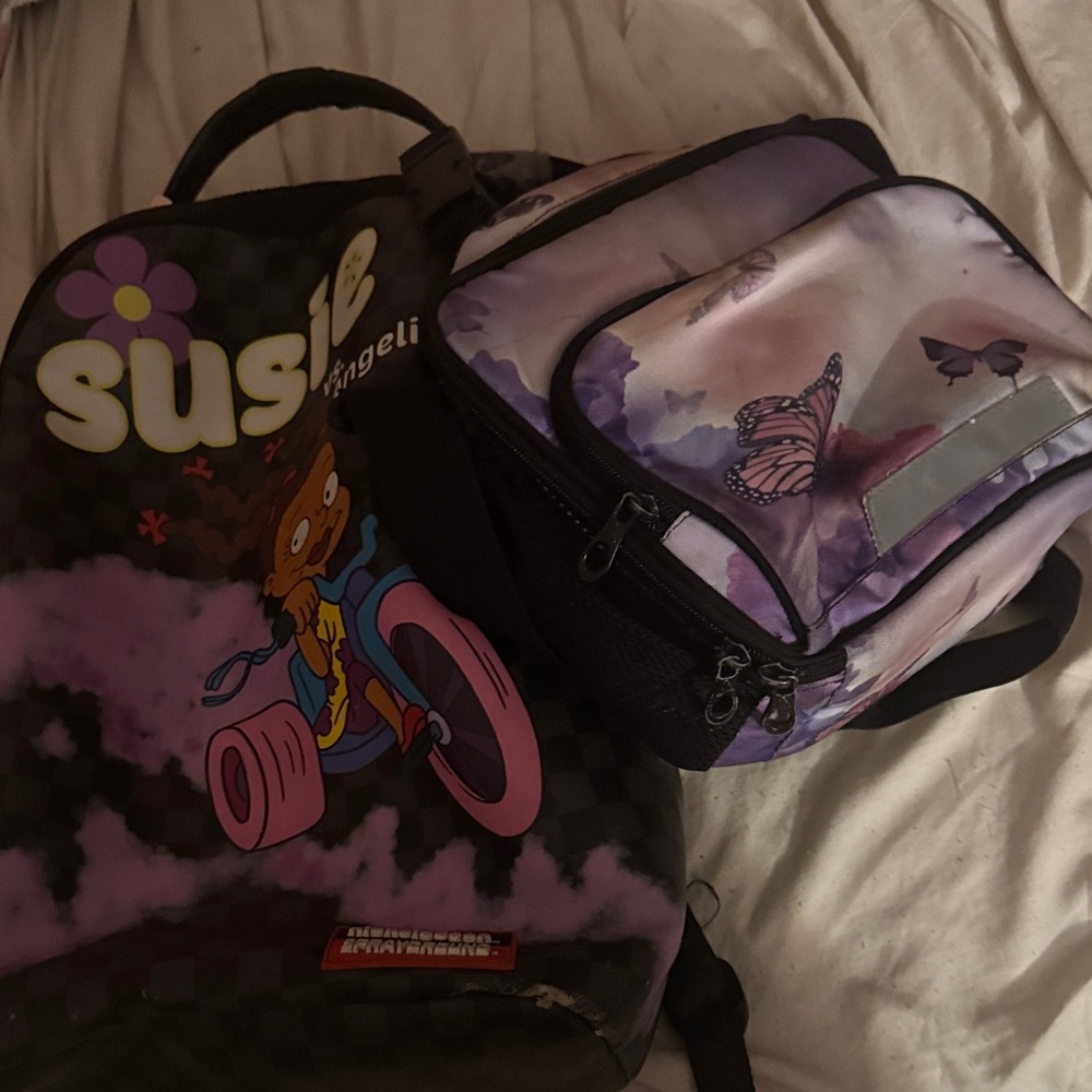 Sprayground Purple and Black Cartoon Backpack Set